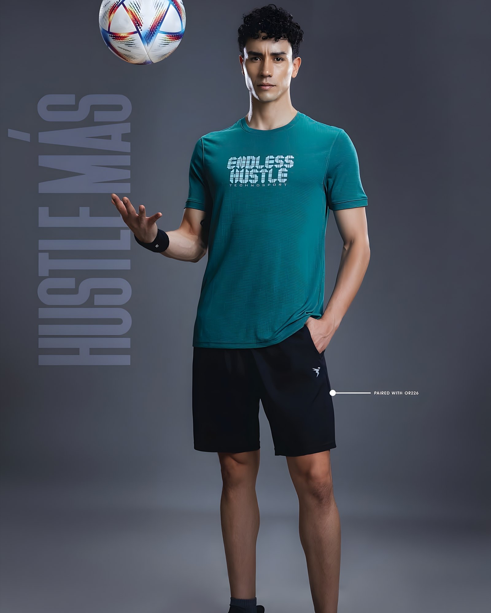 Man in a teal performance tee juggling a football