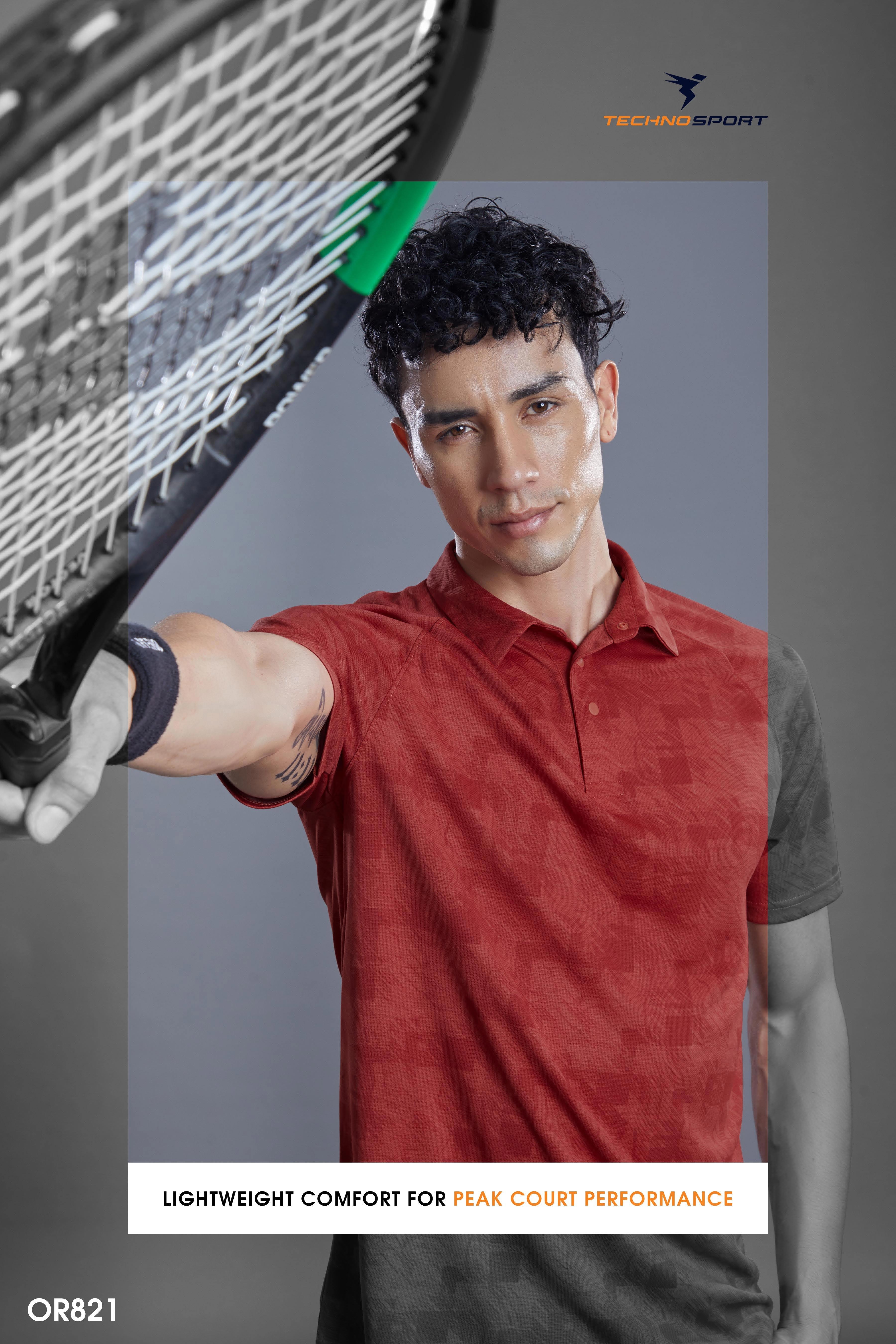 Man in a red Technosport polo holding a tennis racquet